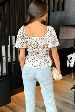 Cream And Black Spot Printed Flutter Sleeve Shirred Waist Top