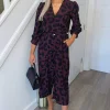 Plum And Black Printed Belted Long Sleeve Jumpsuit