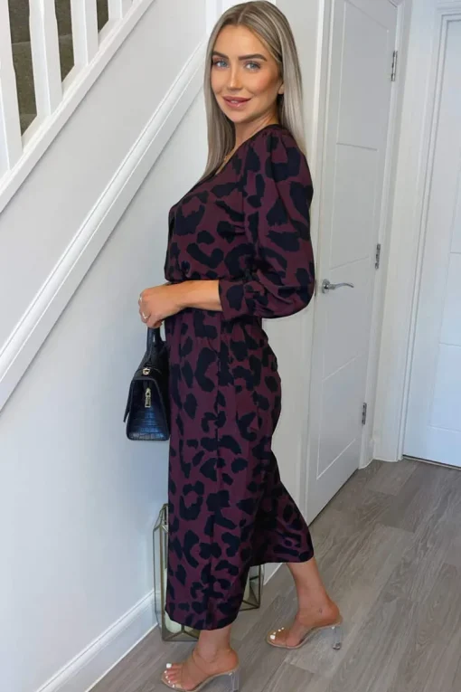 Plum And Black Printed Belted Long Sleeve Jumpsuit